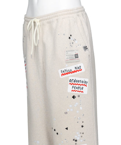 EMBELLISHED STICKER SWEAT PANTS